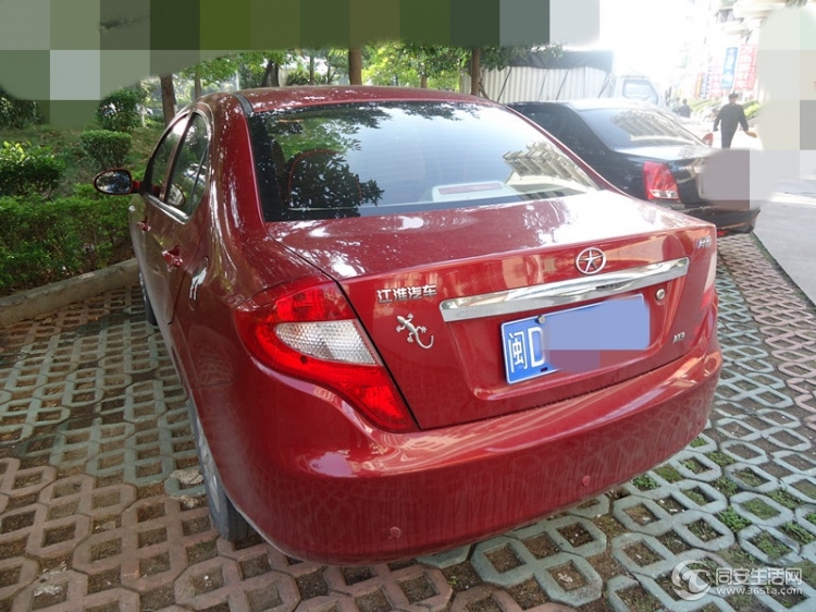 09年的江淮同悦,红色1.3